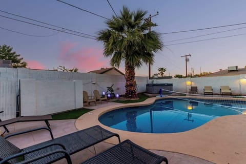 Enjoy the spacious pool and hot tub, perfect for day or night dips.