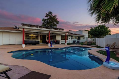 Enjoy the spacious pool and hot tub, perfect for day or night dips.