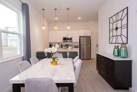 Spacious dining table designed for shared meals and gatherings.