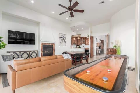 Shuffleboard, poker table, and plenty of games.