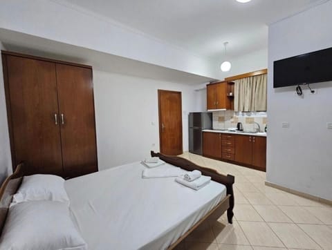 Economy Studio, Balcony, Garden View | Iron/ironing board, free WiFi