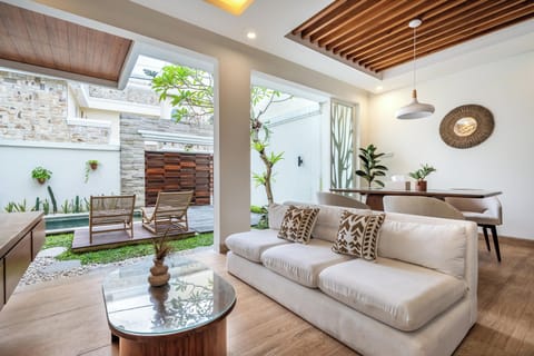 Deluxe Villa, 2 Bedrooms, Balcony, Pool View | Living area | 50-inch Smart TV with digital channels, Netflix, streaming services