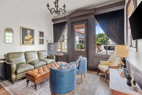 Spacious living room with comfortable seating and a smart TV.