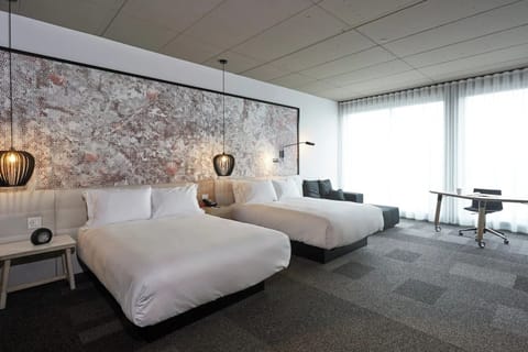 Spread out comfortably with two plush beds and spacious floor area.
