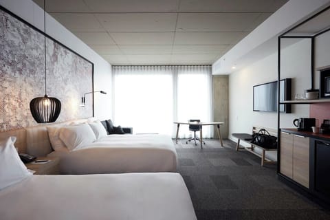Unwind in a bright studio with sleek in-room conveniences.