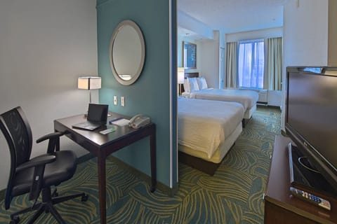 Feel at home with a work nook and comfortable beds.