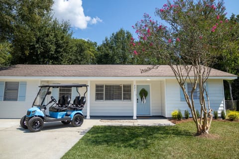 The Audrey is located less than mile to beach & comes with a golf cart!