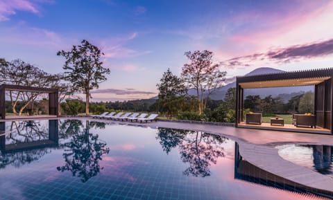 Outdoor pool, open 7:00 AM to 7:00 PM, free cabanas, pool umbrellas