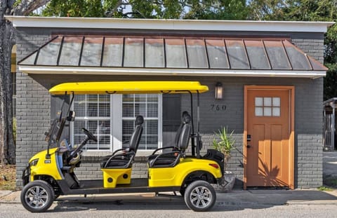 Vacay wheels: Bright yellow golf cart awaits your next adventure in Biloxi! Available for rent.
