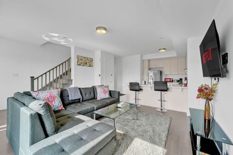 Unwind in a modern open concept retreat designed for relaxation. Whether you are prepping a meal in the bright kitchen or curling up for a movie night, this stylish space offers the perfect home base for your next getaway.