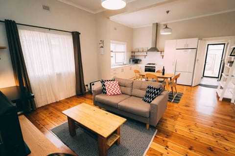 Sink into the comfortable sofa and unwind with a book or your favourite shows, with soft natural light creating an easy, relaxed feel.
