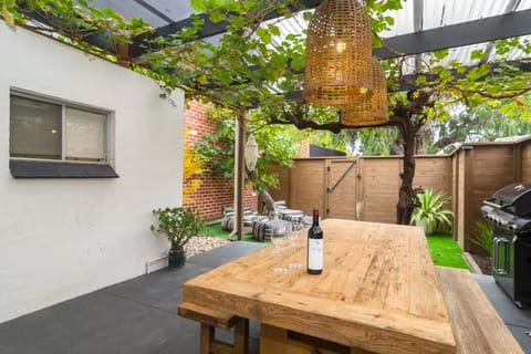 Gather under century-old vines for long lunches, summer BBQs, or evening drinks in a leafy, private haven.