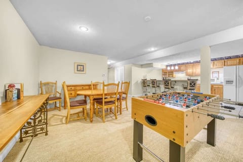 Lower-level rec room with games, living room with fireplace, additional sleeping, and a 2nd full kitchen!