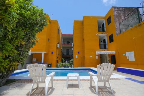 Unwind on loungers while the pool sparkles in front.