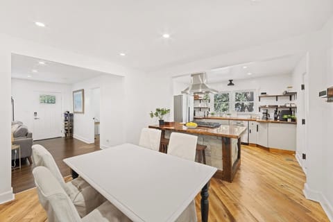 Open floor plan; dining room connects kitchen and living room.
