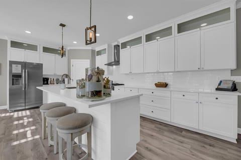 Morning coffee tastes better from this island seat.