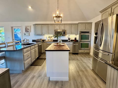 Kitchen with ample cooking supplies for a chefs dream