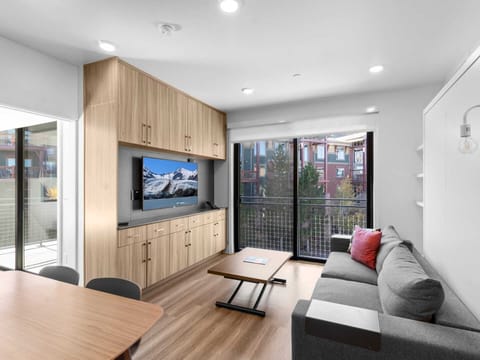 Dining, living, and bedroom off to the side