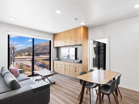 Dining, living, and bedroom off to the side
