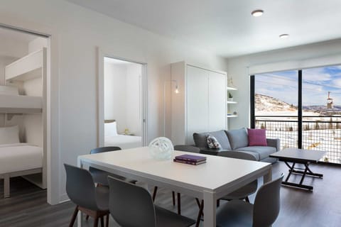 Dining, living, and the two bedrooms