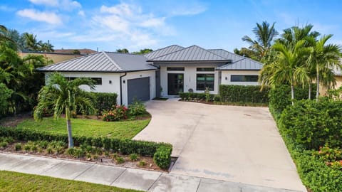 The private home offers parking for three cars in the driveway.