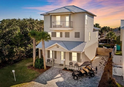 The Barnacle - Sleeps 20! Private gated beach access just steps away and FREE golf cart included! Private backyard oasis with heated pool, hot tub, lounge chairs, hammocks, outdoor dining table, and gas grill!