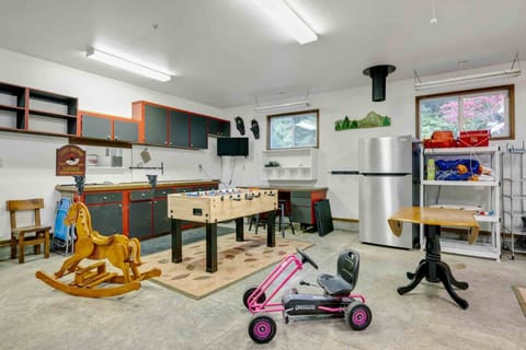 The game room is full of plenty of fun activities and toys.