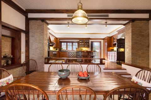 The breakfast table, down a few steps from the kitchen.