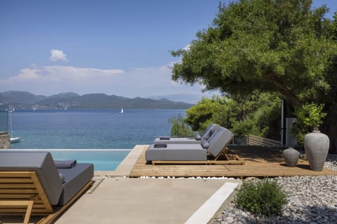 Lounging by Eolia's infinity pool admiring the views.