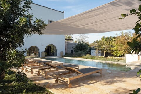 The beautiful pool sits serenely in the gardens.