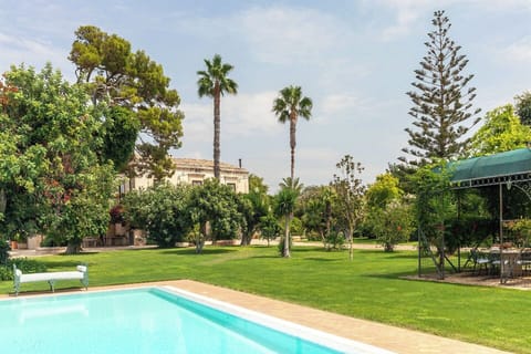 The stunning pool and gardens.