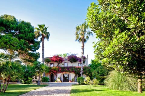 The bougainvillea and jasmin strewn facade.