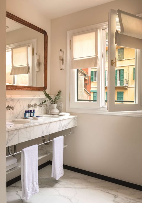 Room (Village View) | Bathroom | Rainfall showerhead, hair dryer, bathrobes, slippers