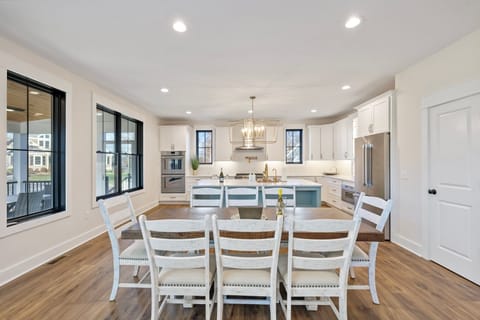 Seating for 8 in the kitchen area is a great place for meals and games