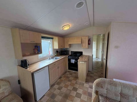 the kitchen is equipped + microwave +coffee maker