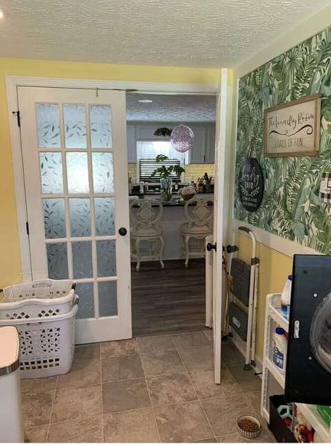 Laundry room is right off the kitchen.
