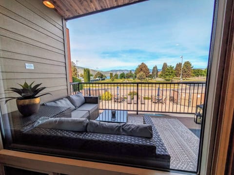 Soak up the pool, park, and make views from anywhere in the living room. 