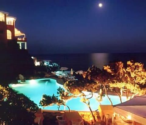Indoor pool, outdoor pool, pool umbrellas, sun loungers