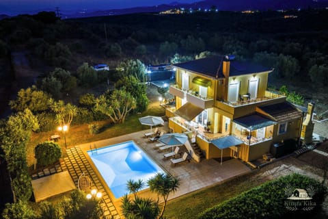 Aerial View of Villa and Pool – Nestled in a grove of olive trees.