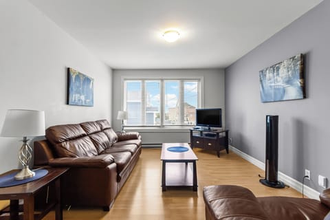 Bright Living Room with Big Windows - 
Relax and recharge in natural light.
