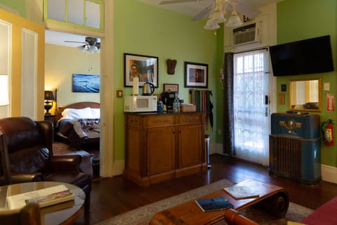 Deluxe Suite, 1 Bedroom, Courtyard View, Garden Area | Living area | 48-inch flat-screen TV with cable channels, TV, Netflix