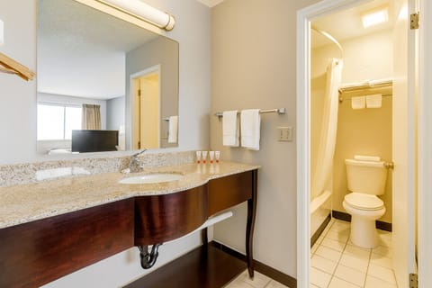 Combined shower/tub, towels, soap, shampoo