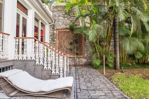 Lounge beneath the trees in a private retreat made for quiet afternoons.