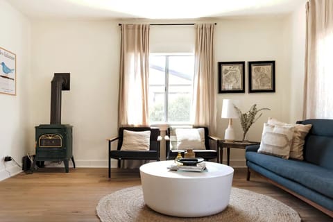Living room has ample seating to watch movies on our smart tv and fast internet.