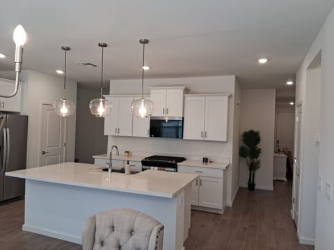 Enjoy this beautiful open floor concept where you can cook family dinner 