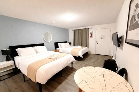 Enjoy a restful night on two queen beds after an exciting day of adventure.