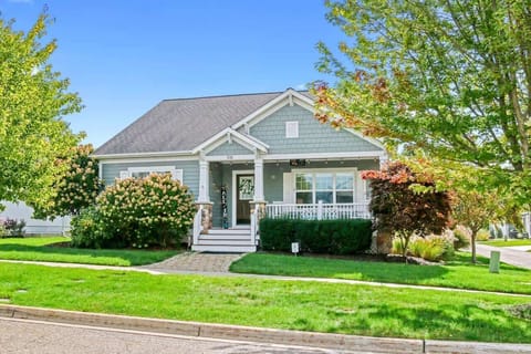 Your group with be "All In at Trailside!" This home has access to a community pool, a private fire pit and a game room with wet bar in the lower level! 