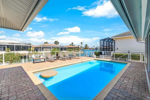 Large Heated Pool with swim up table