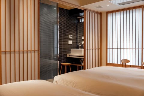 Standard Twin Room | Living area | 40-inch TV with digital channels