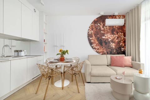 Enjoy your favorite shows on the flat-screen television in the elegant living area.